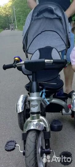 Трехколесный велосипед с ручкой