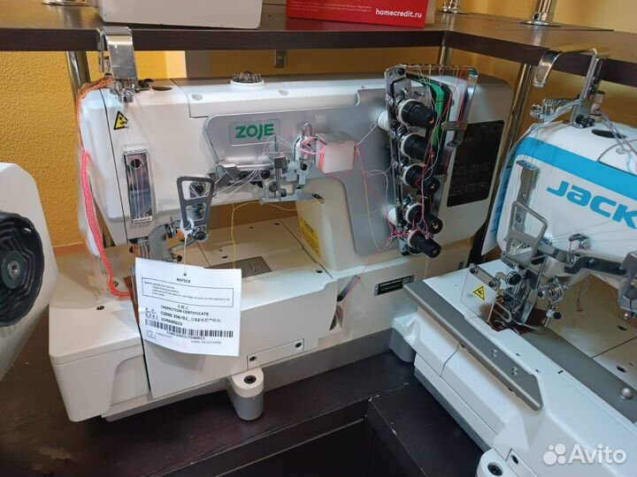 Плоскошовная швейная машина zoje