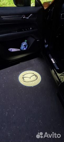 Mazda CX5 KF Подсветка в двери проекция C850V7540A