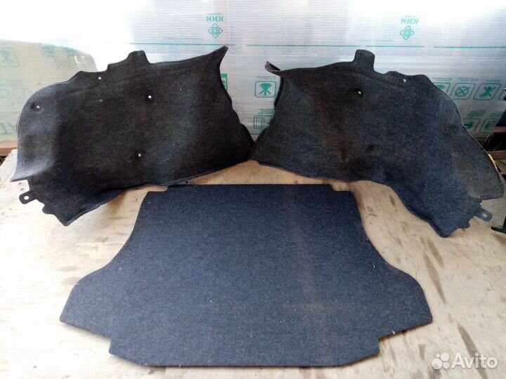 Обшивка багажника Nissan Tiida