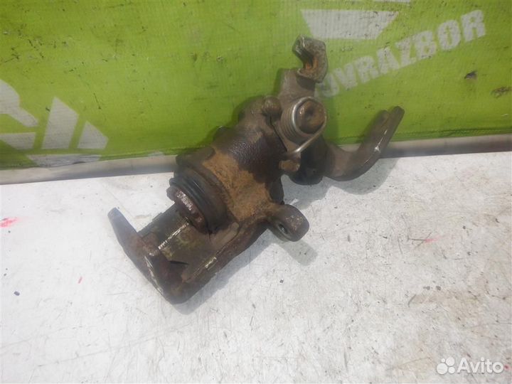 Суппорт задний левый Хендай Лантра 96-00