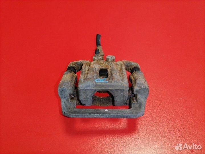 Суппорт задний правый Nissan Pathfinder R51 VQ40DE