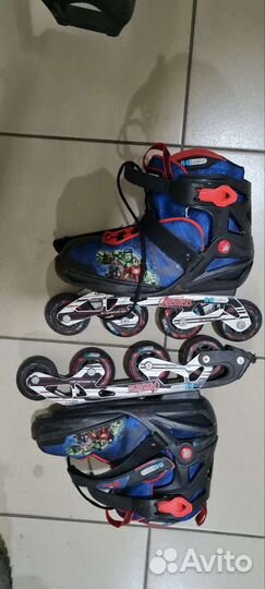 Роликовые коньки