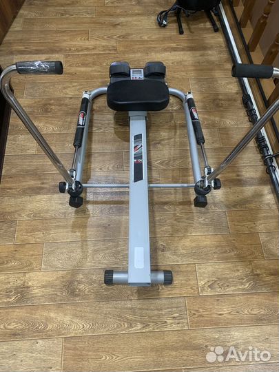 Гребной тренажер