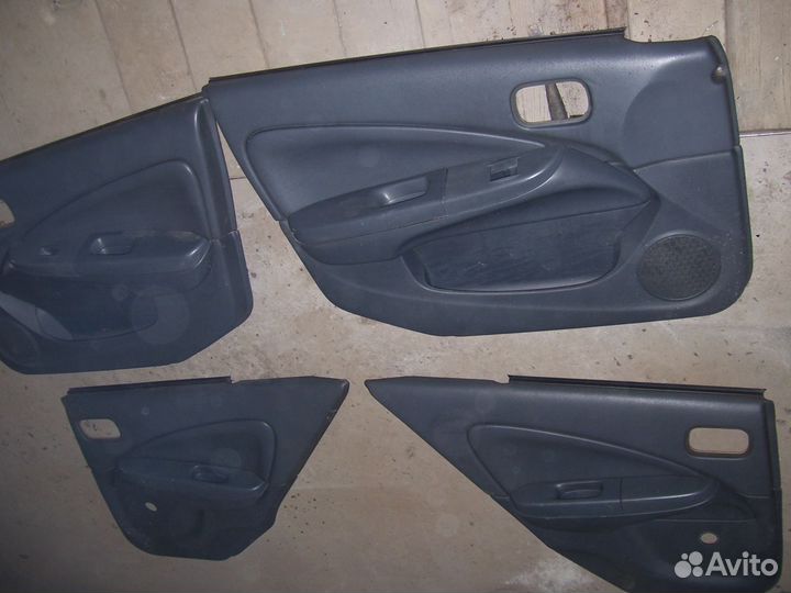 Ниссан альмера обшивки дверей