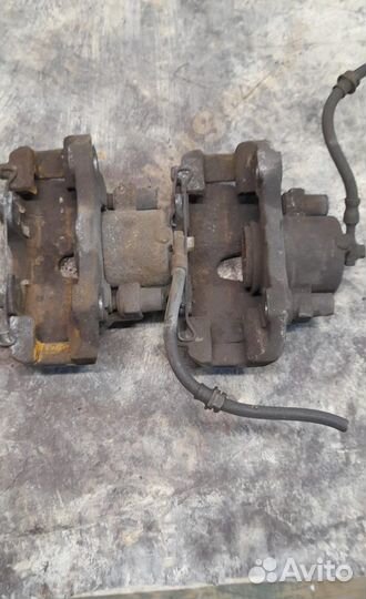 Суппорт тормозной передний Opel Astra H