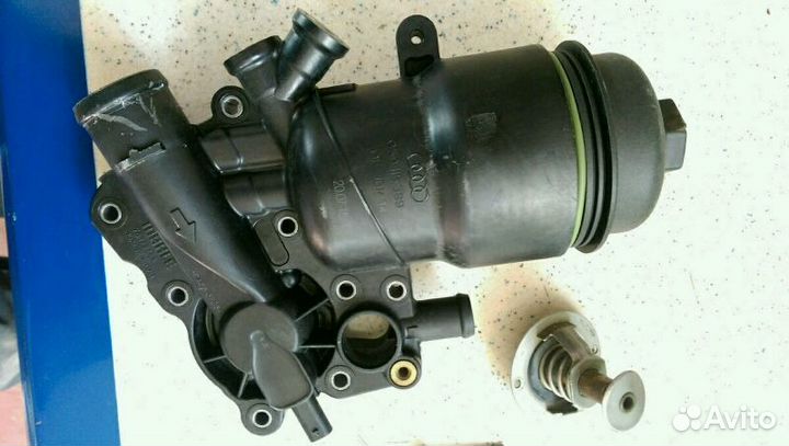 Корпус масляного фильтра на ауди Q7, Touareg, туар