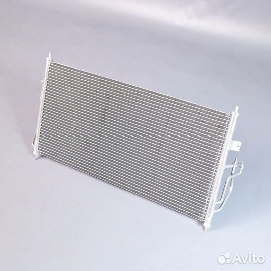 Радиатор кондиционера Ниссан Альмера В10 06-12