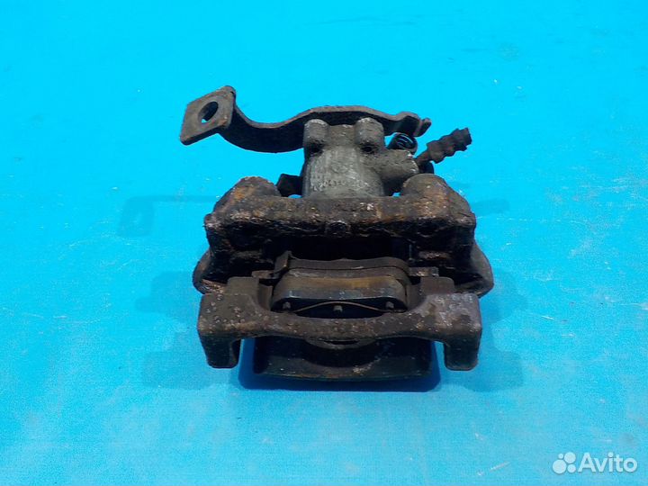 Тормозной суппорт задний левый toyota Auris (E15)