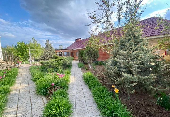 Коттедж 370 м² на участке 20 сот.