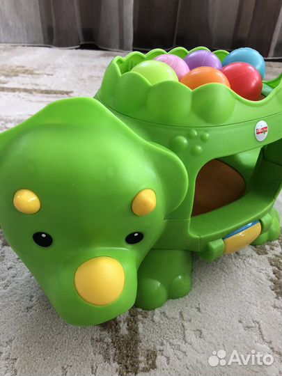 Динозавр fisher price