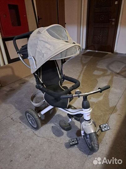 Трехколесный велосипед с ручкой