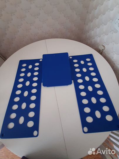 Приспособление для складывания одежды и белья