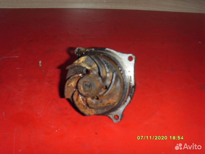 Насос водяной (помпа) 1207156 Ford Focus 1 (DFW)