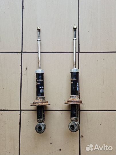 Стойка амортизатор задний Mitsubishi Lancer IX