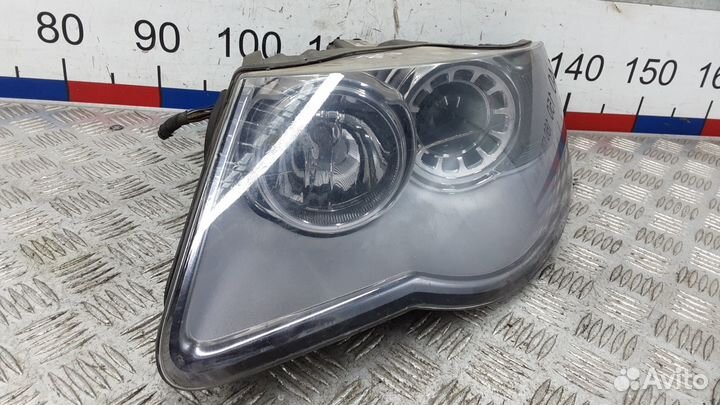 Фара левая Volkswagen Touareg