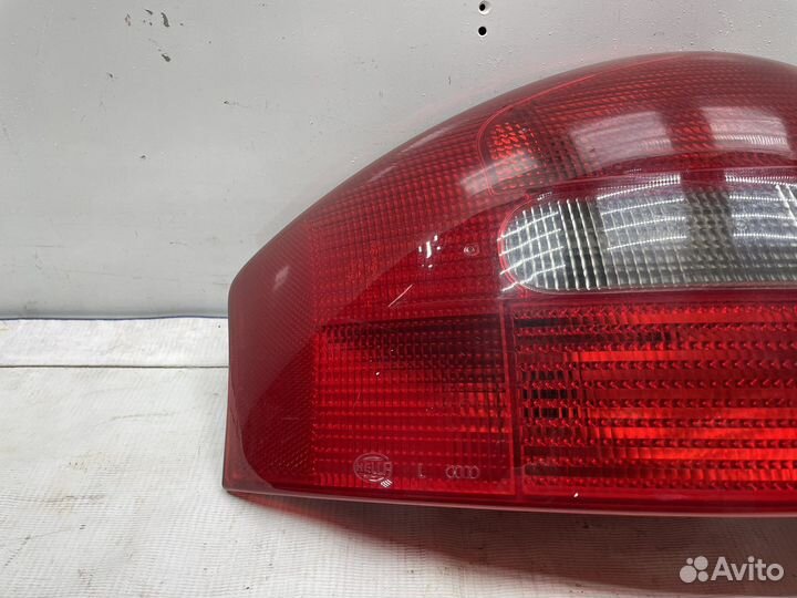 Фонарь левый Audi A6 C5 седан(дефект)