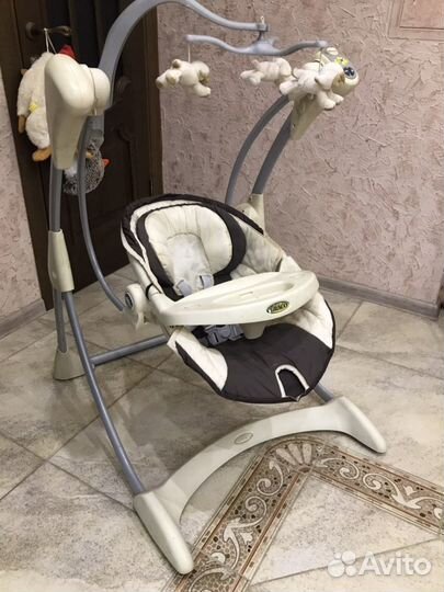 Детские электронные качели “Graco”