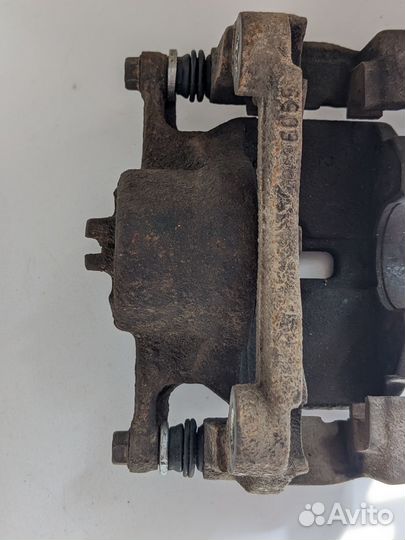 Суппорт тормозной передний Nissan Qashqai J10 рест