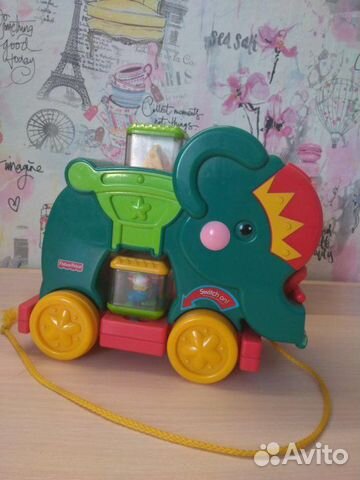 Fisher Price слон-каталка музыкальный