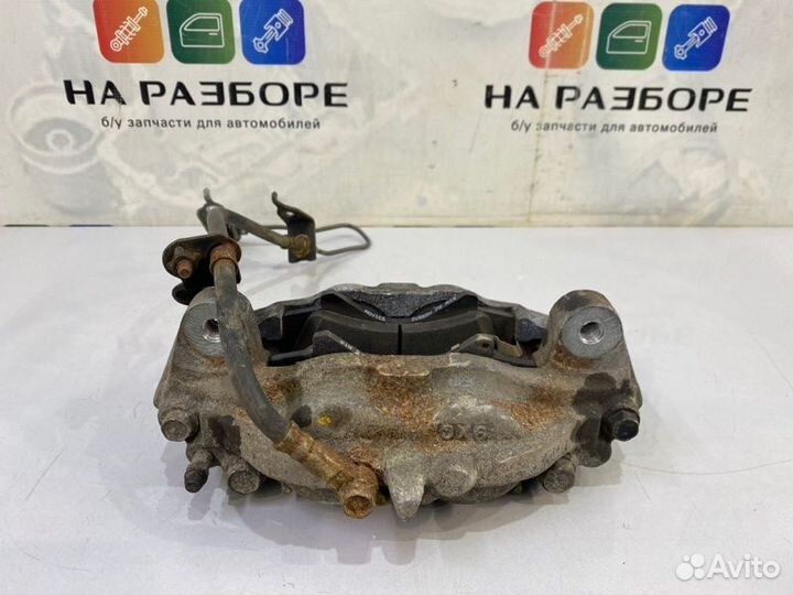 Суппорт передний левый Toyota Land Cruiser 200