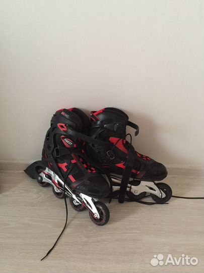 Роликовые коньки