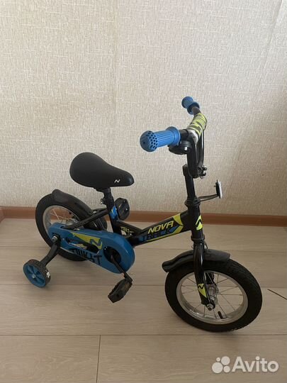 Велосипед детский четырёх колесный