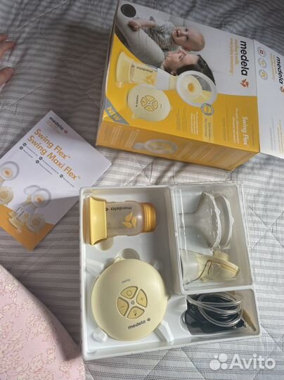 Молокоотсос medela электрический