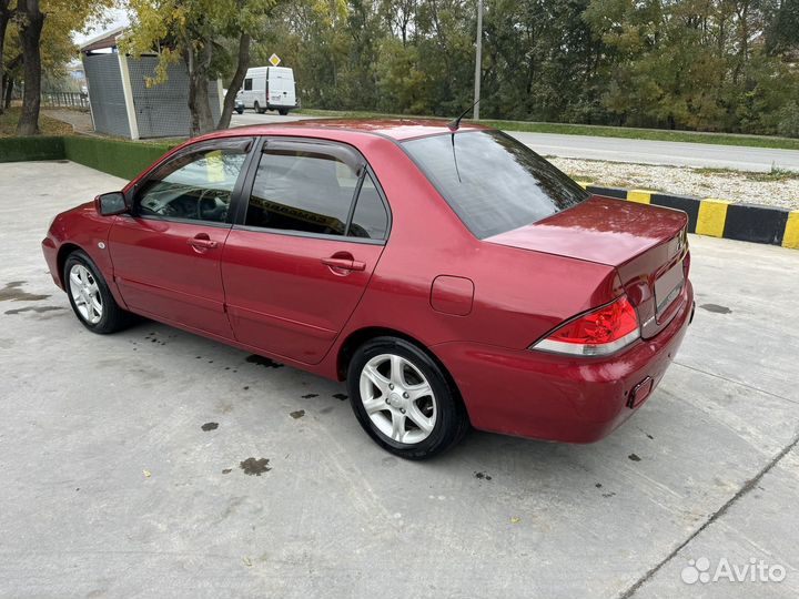 Mitsubishi Lancer 1.6 МТ, 2006, 238 500 км