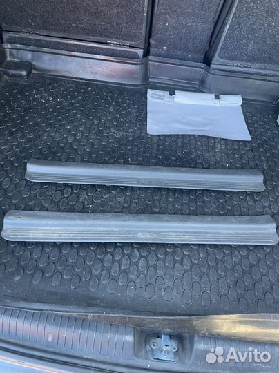 Накладки порогов киа спектра