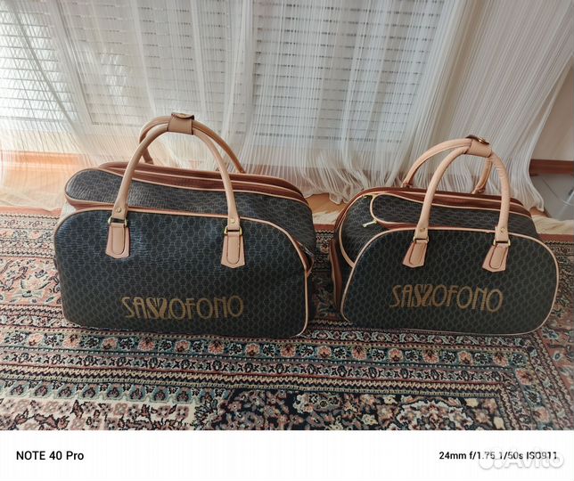 Дорожные сумки с колёсиками и ручкой