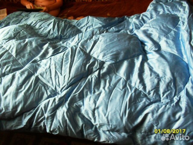 Настоящее новое пуховое одеяло