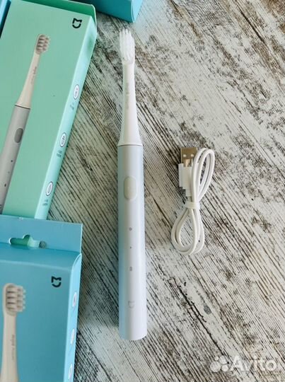 Электрическая зубная щетка новая