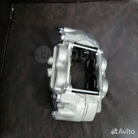 Суппорт тормозной перед R/L Land Cruiser Prado