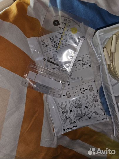 Молокоотсос medela swing flex