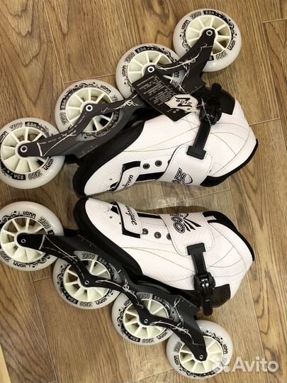 Коньки роликовые