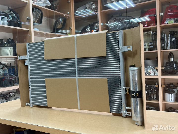Радиатор кондиционера Шевроле Лачетти