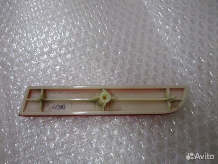 Отражатель в бампер задний левый Mitsubishi