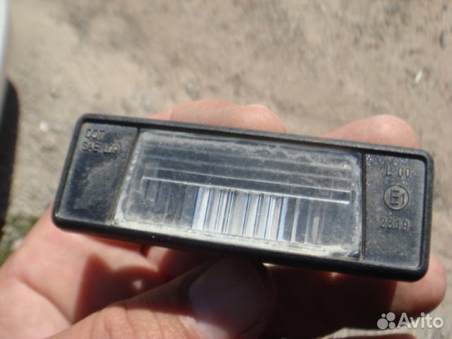 Ниссан Фонарь подсветки номера Nissan 2006-19