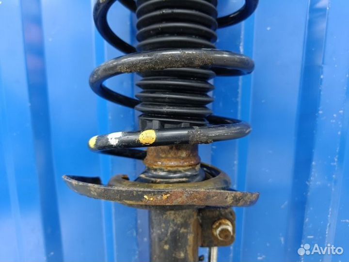 Амортизатор передний левый Peugeot 301 DD 1.6 NFP