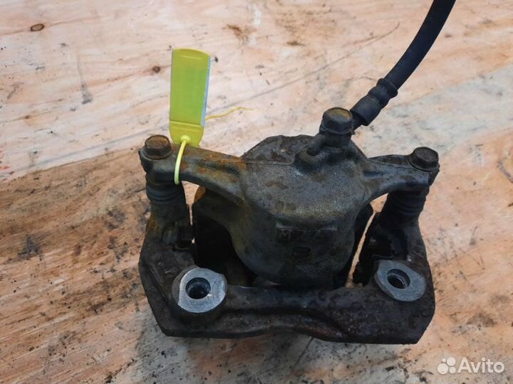 Суппорт передний левый Toyota Mark Ii GX105 1GFE