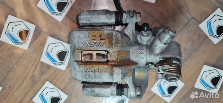 Суппорт задний левый тормозной Honda Civic 4D