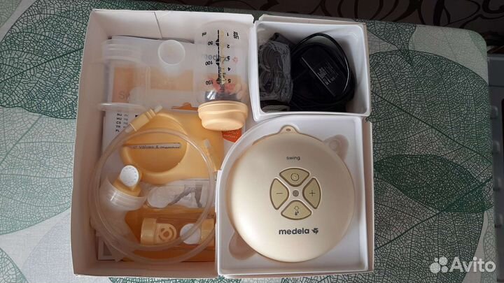 Молокоотсос medela электрический