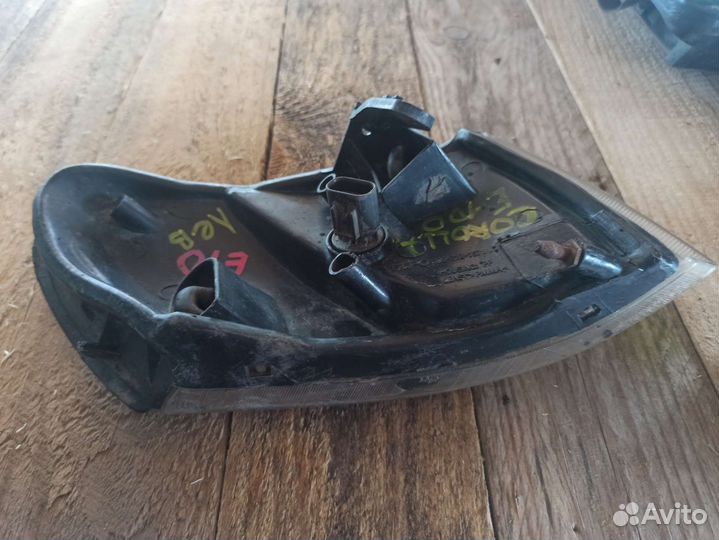 Поворотник левый Corolla 7 e100