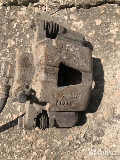 Суппорт передний правый Daewoo Nexia 100 1.5 2006