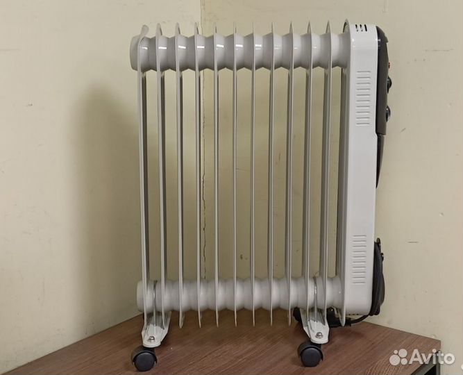 Масляный радиатор обогреватель Ресанта омпт-12Н