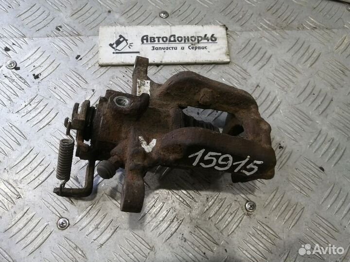 Суппорт задний левый Chevrolet Cruze