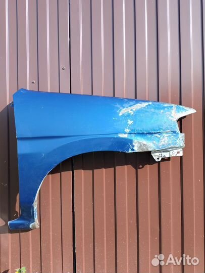 Крыло mazda demio