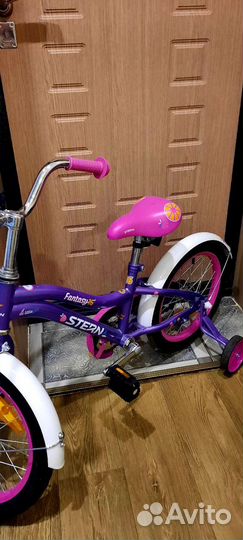 Велосипед для девочки 6 лет