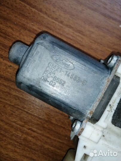 Моторчик стеклоподъемника зад. лев. Форд мондео 4